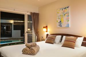 Katil atau katil-katil dalam bilik di WoLin Lemon Resort