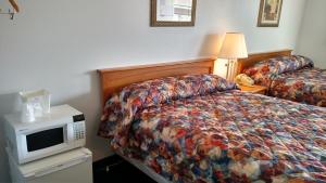Postel nebo postele na pokoji v ubytování A Wyoming Inn