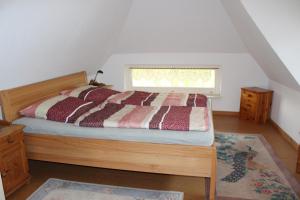 Postel nebo postele na pokoji v ubytování Ferienhaus "Am Deich 30"