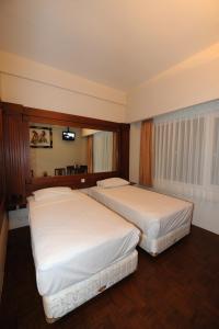 Katil atau katil-katil dalam bilik di Wirton Hotel +19 gambar