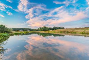 a view of a river with clouds in the sky at Ramson Lodge in Chappel