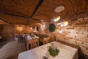 Reštaurácia alebo iné gastronomické zariadenie v ubytovaní Penzion Martina****
