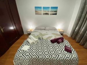 Ένα ή περισσότερα κρεβάτια σε δωμάτιο στο Sand & Sun - 2 Bedrooms Apartment 50m beach