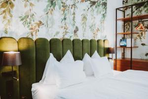Posteľ alebo postele v izbe v ubytovaní Hotel Brücklwirt