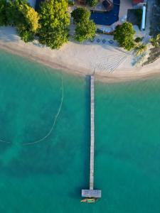 an aerial view of a dock in the water at Cruiser Island By Swiss-Belhotel in Ko Lone