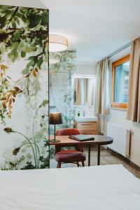 Posteľ alebo postele v izbe v ubytovaní Hotel Brücklwirt