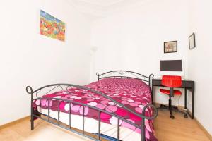 En eller flere senge i et værelse på Coup de cœur à Montmartre