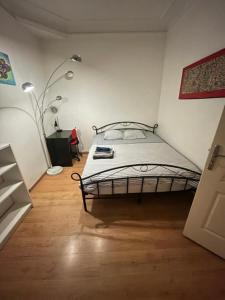 En eller flere senge i et værelse på Coup de cœur à Montmartre