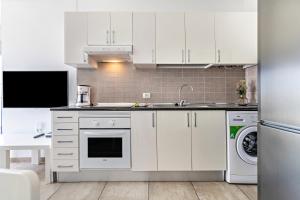 Kuchyň nebo kuchyňský kout v ubytování Barlovento Apartment