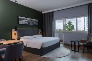 Voodi või voodid majutusasutuse Park Inn by Radisson, Lagos Victoria Island toas