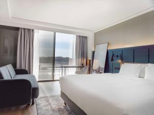 Postel nebo postele na pokoji v ubytování Radisson Blu Waterfront Hotel, Stockholm