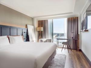 Postel nebo postele na pokoji v ubytování Radisson Blu Waterfront Hotel, Stockholm