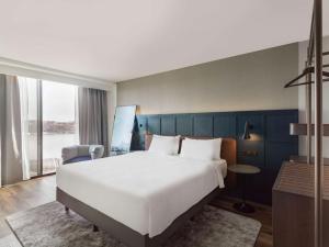 Postel nebo postele na pokoji v ubytování Radisson Blu Waterfront Hotel, Stockholm