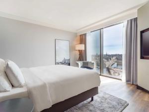 Postel nebo postele na pokoji v ubytování Radisson Blu Waterfront Hotel, Stockholm