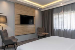 Televiisor ja/või meelelahutuskeskus majutusasutuses Park Inn by Radisson, Lagos Victoria Island