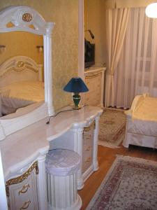 A bed or beds in a room at Aqua Vita - Zhyva Voda