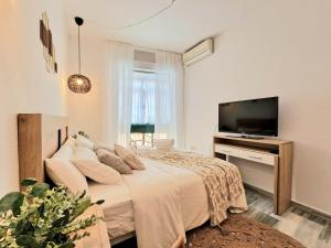 Postel nebo postele na pokoji v ubytování AA Guest - Victoria Center Eco Apartment