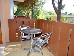 A balcony or terrace at Adorable cozy flat for 4 guests next to the beach
