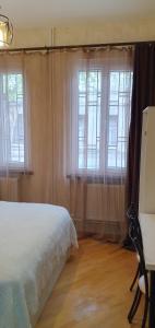 Ένα ή περισσότερα κρεβάτια σε δωμάτιο στο Number 9