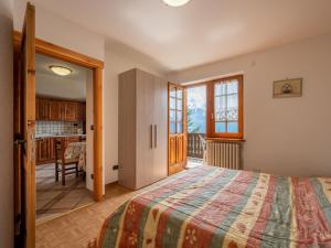 A bed or beds in a room at Apartment Chaouette by Interhome