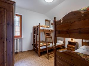 A bed or beds in a room at Apartment Chaouette by Interhome