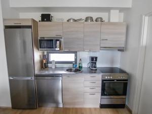 Nhà bếp/bếp nhỏ tại Holiday Home Ylälänsi 3 as 9 by Interhome