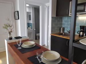 A kitchen or kitchenette at Aqua Apt Sunrise & Sea Views