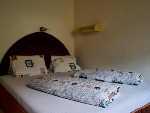 Säng eller sängar i ett rum på Apartment 547-3 by Interhome