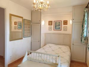 Postel nebo postele na pokoji v ubytování Apartment studio 18-20m2 by Interhome