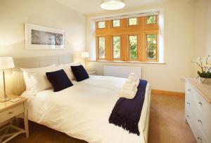 Llit o llits en una habitació de New Lodge