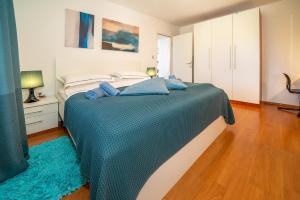 Postel nebo postele na pokoji v ubytování Apartment Jelka 1 + 12 fotografií