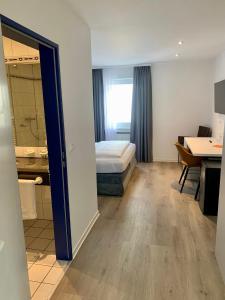 Postel nebo postele na pokoji v ubytování Hotel Wittlicher Hof