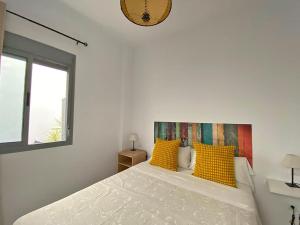 Posteľ alebo postele v izbe v ubytovaní TRIANA EXCLUSIVE con terraza privada