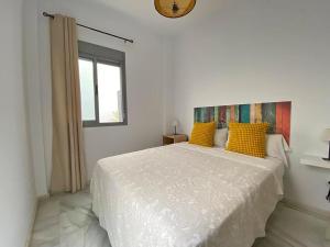 Posteľ alebo postele v izbe v ubytovaní TRIANA EXCLUSIVE con terraza privada