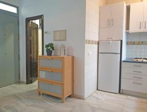 Kuchyňa alebo kuchynka v ubytovaní TRIANA EXCLUSIVE con terraza privada