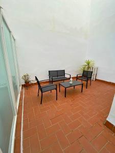 Posedenie v ubytovaní TRIANA EXCLUSIVE con terraza privada