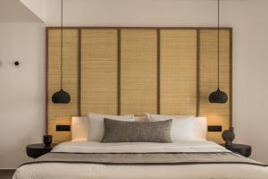 Cama ou camas em um quarto em Grace Mykonos