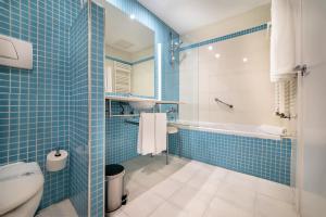 Koupelna v ubytování Albir Playa Hotel & Spa