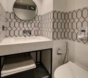 Kúpeľňa v ubytovaní 7 Apple Hotel Pratap Nagar, Jaipur