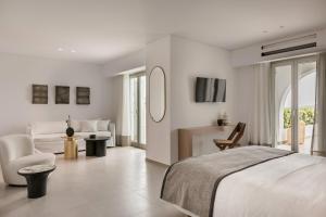 Cama ou camas em um quarto em Grace Mykonos