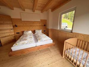 Postel nebo postele na pokoji v ubytování Holiday Home Hettegg Lehen by Interhome