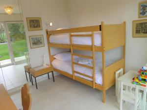 Ένα ή περισσότερα κρεβάτια σε δωμάτιο στο Apartment Marigny Dent-Blanche 9-8 by Interhome