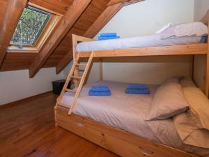 a bedroom with bunk beds in a cabin at Apartment Peak by Interhome in Taüll