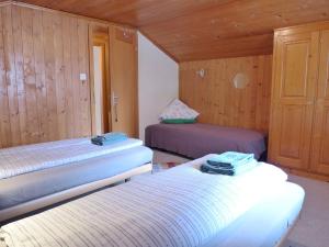 Postel nebo postele na pokoji v ubytování Apartment Vreneli by Interhome