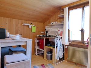 Kuchyň nebo kuchyňský kout v ubytování Apartment Vreneli by Interhome
