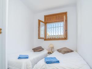 Posteľ alebo postele v izbe v ubytovaní Holiday Home Cala by Interhome