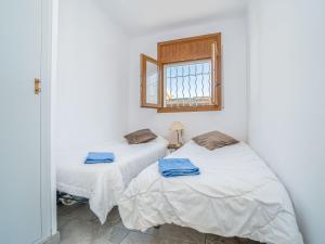 Posteľ alebo postele v izbe v ubytovaní Holiday Home Cala by Interhome