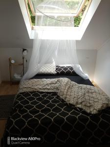 Postel nebo postele na pokoji v ubytování Um Burebierg apartment 35m2