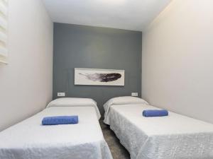 Postel nebo postele na pokoji v ubytování Apartment Abanicos by Interhome