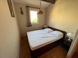 Ένα ή περισσότερα κρεβάτια σε δωμάτιο στο Villa Port Barcarès, 3 pièces, 4 personnes - FR-1-81-210
